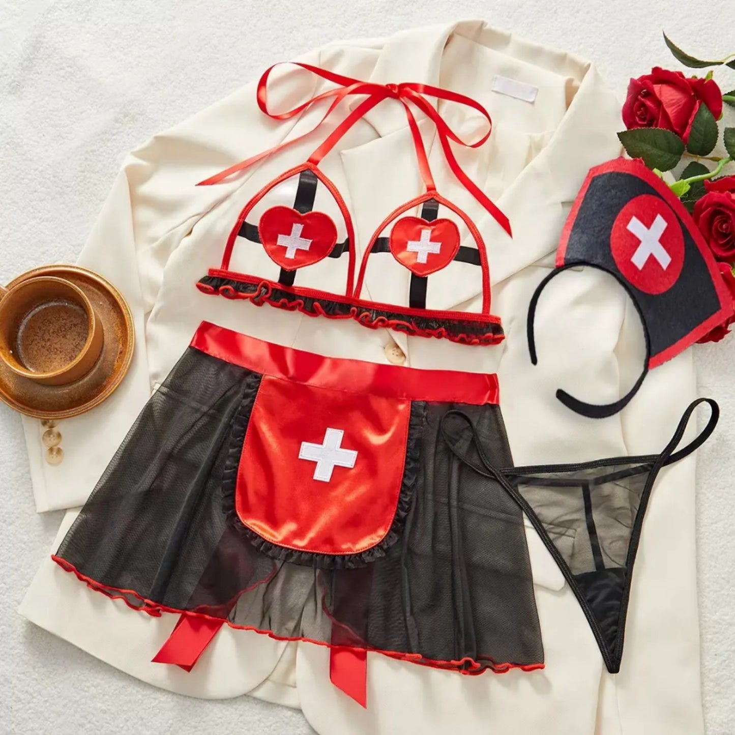 Red and black nurse roleplay lingerie set flat lay by Zeerjama